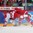 HELSINKI, FINLAND - JANUARY 2: Denmark's Morten Jensen #15 gets knocked down by the Russian defender during quarterfinal round action at the 2016 IIHF World Junior Championship. (Photo by Andre Ringuette/HHOF-IIHF Images)

